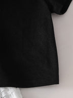 طقم صيفي مكون من قطعتين للبنات الصغيرات: تيشيرت أسود بأكمام قصيرة وبنطال أبيض مزين بفيونكة