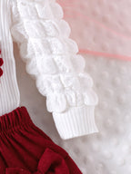 طقم قطعتين للبنات الصغيرات، ربيعي/خريفي، يتكون من تيشيرت بأكمام طويلة منفوخة مزين بنقشة قلوب ثلاثية الأبعاد وتنورة من قماش الكوردروي مزينة بفيونكة.