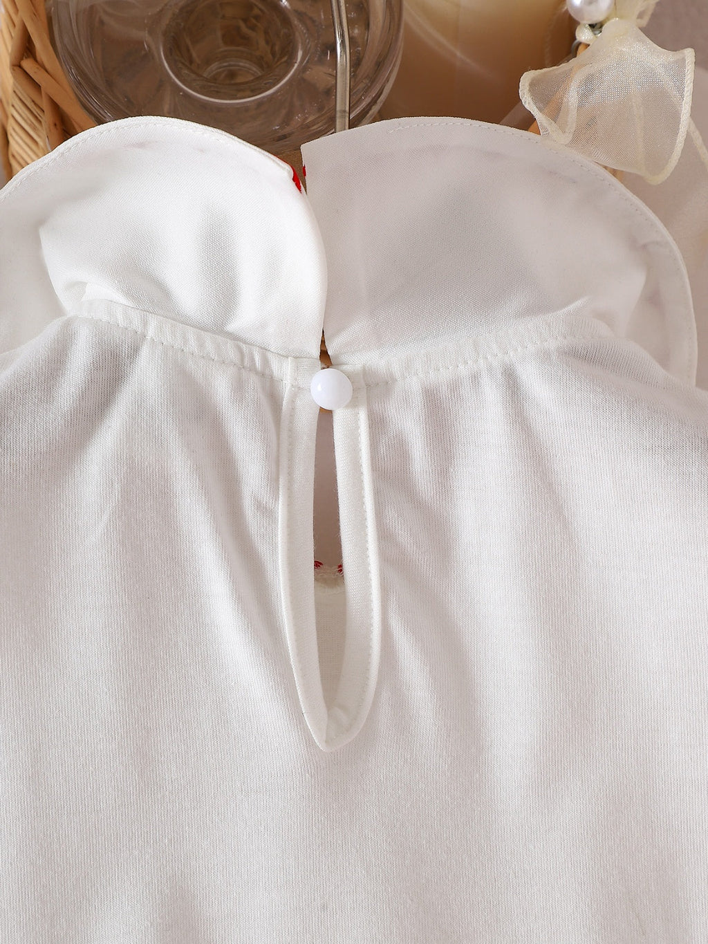 طقم صيفي مكون من قطعتين للبنات الصغيرات: بلوزة قصيرة الأكمام مطرزة بياقة بيتر بان وتنورة مطوية مزينة بالزهور