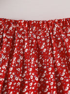 طقم صيفي مكون من قطعتين للبنات الصغيرات: بلوزة قصيرة الأكمام مطرزة بياقة بيتر بان وتنورة مطوية مزينة بالزهور