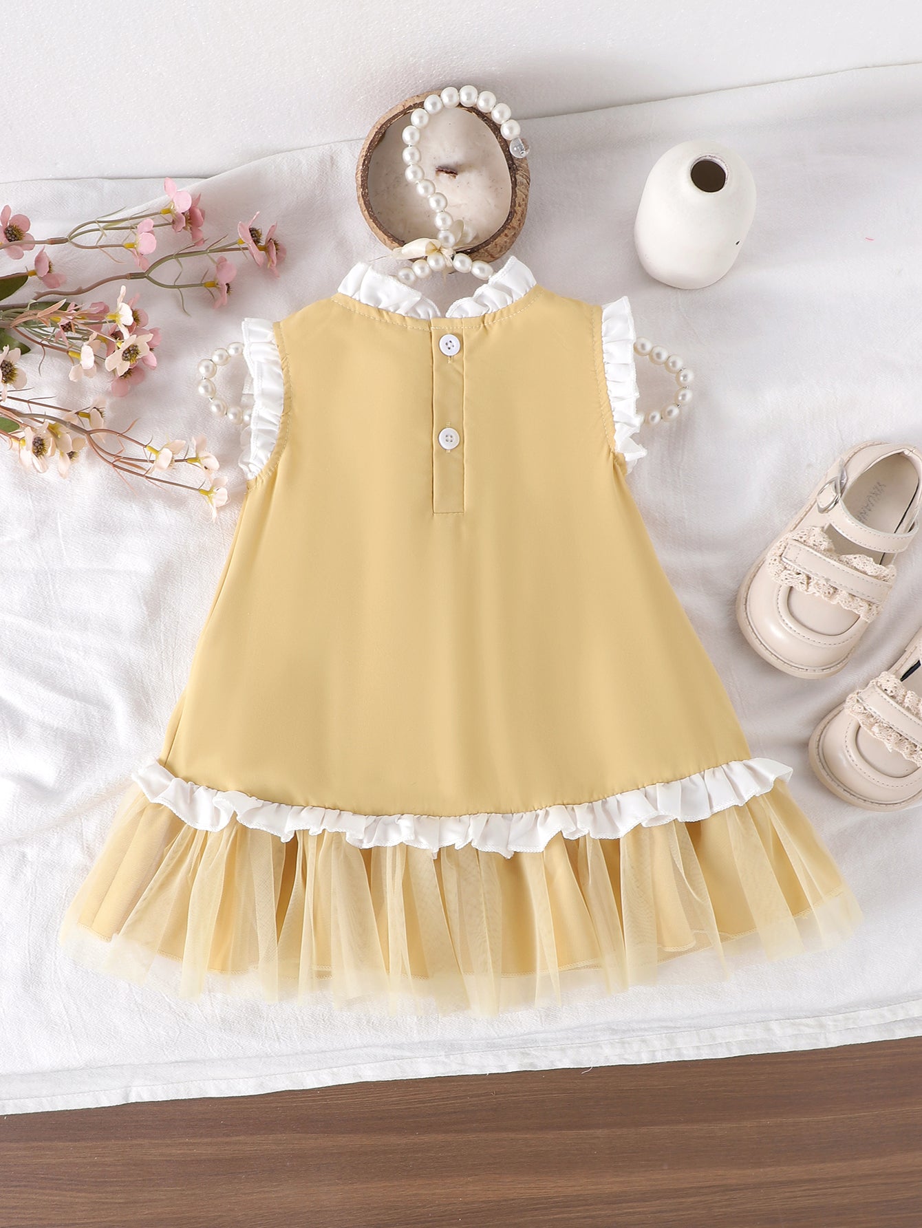 Baby Girls Yellow Sleeveless Ruffle
Dress