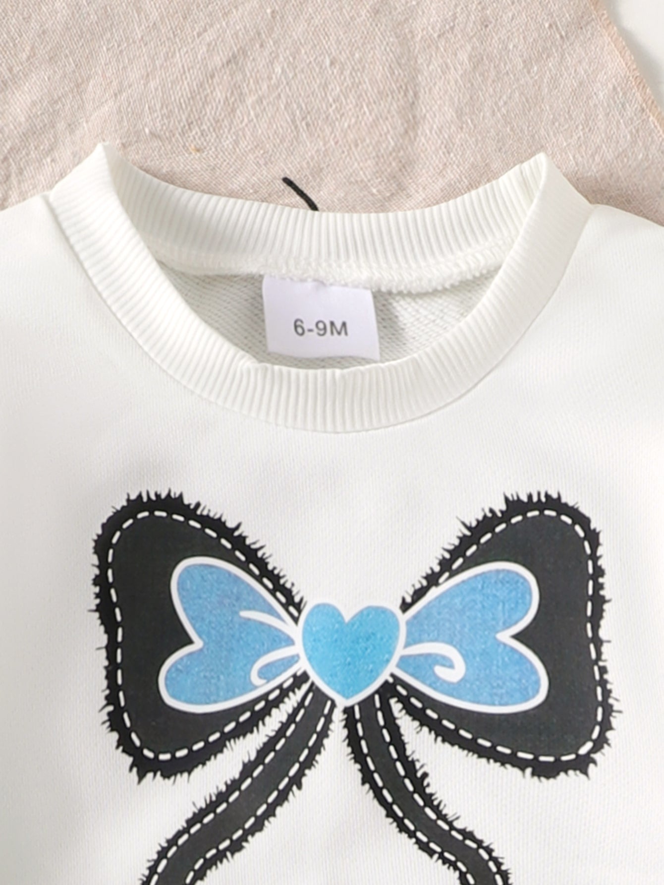 Baby Girls Spring/Autumn Long-sleeve Sweatshirt with Bow Print and Flared Jeans Two-piece Set