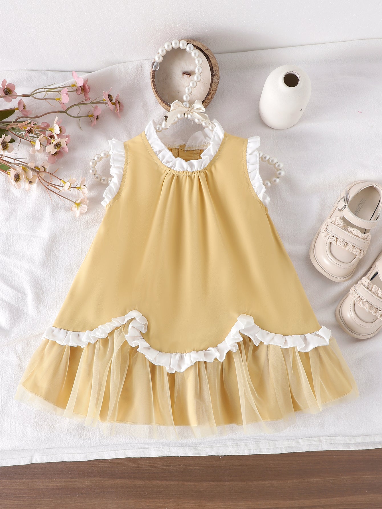 Baby Girls Yellow Sleeveless Ruffle
Dress
